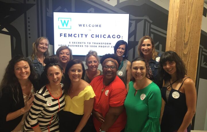 banner of the group of people smiling at the welcome to femcity chicago event 