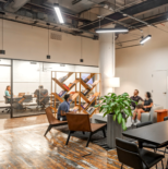 group of people sitting and talking in the west loop office