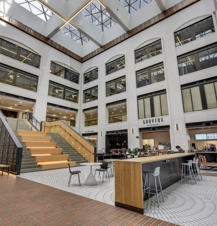 view of grayfox cafe and wine building showing table and chair arrangement