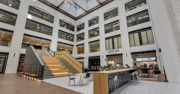 view of grayfox cafe and wine building showing table and chair arrangement
