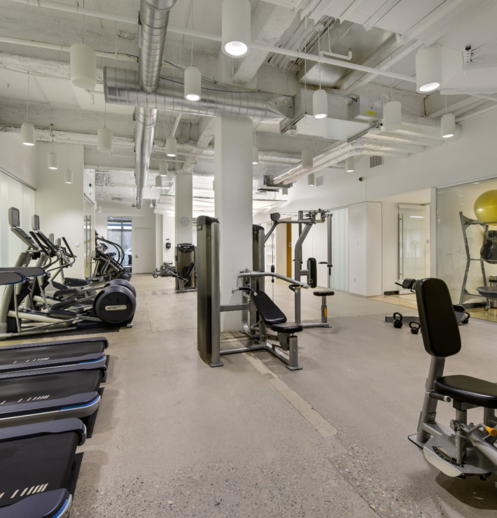 workbox downtown gym filled with lots of machines and exercise equipment