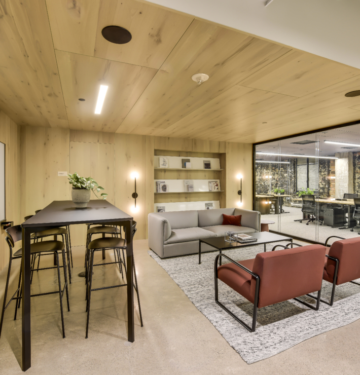 downtown office filled with furniture and a board