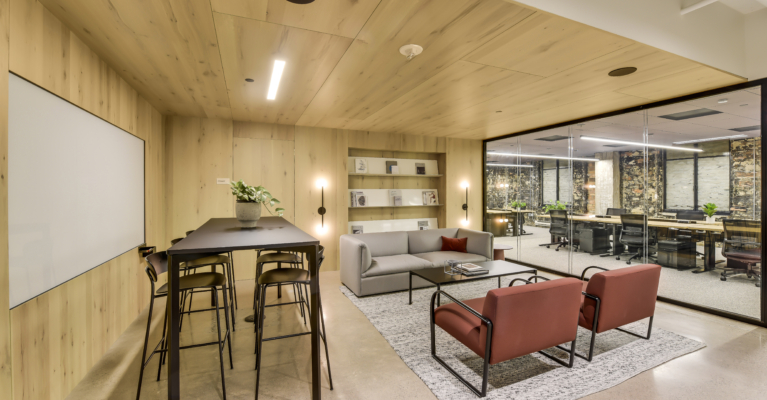 downtown office filled with furniture and a board