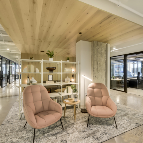 two chairs and a table at workbox downtown minneapolis grand opening