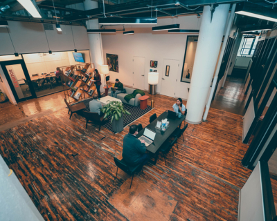 wide-view showing table chairs of a west loop office